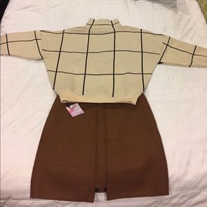 Grid turtleneck sweater and wool skirt